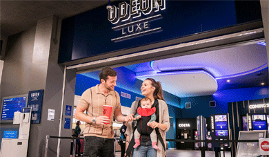 Family outside Odeon Cinema