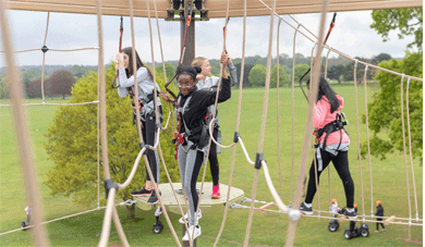 Climbing up high at Mote Park Outdoor Adventure